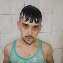 queeruy: Green Tank Top in Shower