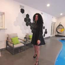 WetlookFashion: Bella Swimming in a Dress, Fishnet Tights and Heels