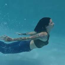 WetlookFashion: Lexie in the Pool Wearing Jeans, Crop Top and Flip Flops