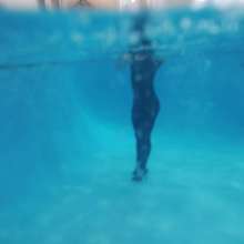 WetlookFashion: Lilith Jumps in the Pool Wearing Wetlook Leggings