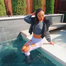 WetlookFashion: Christy Swims Wearing Jeans, Sweater, Boots and a Jacket