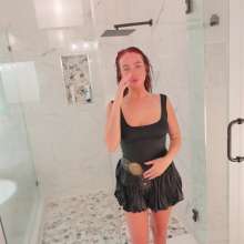WetlookFashion: Emma Showers in a Cute Skirt Outfit