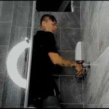 WETColours: Nico in the Shower with Black Nike Polo