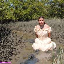Messy Temptress: Peasant Girl Pelted with Smelly Mud--Punished and Humiliated