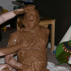 Muddddy: Clay rubbed into face