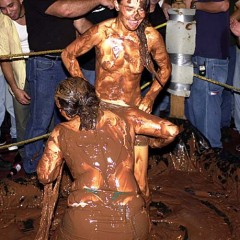 Plonk: A little girl-on-girl pudding wrestling from the vaults.