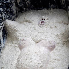Stella: Stella enjoys over 100 lbs of oatmeal in an inflatable spa bath.
