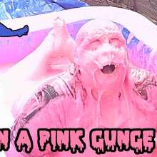 MogAnarchy: Mog Anarchy plays in a pool of neon pink gunge in her PVC catsuit!