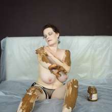 MessyCleo: Cleo enjoys a lot of chocolate paste and some ice cream.