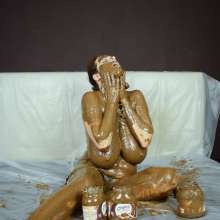 MessyCleo: Cleo enjoys a lot of chocolate paste and some ice cream.