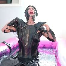 Stella: Stella gets messed up while she is dressed up in a pool of black gunge.