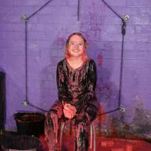DungeonMasterOne: Felicity in catsuit, boots, and studded dress, makes a mess of herself!