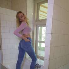 eileenvogel: W286 Eileen taking shower in pink crop top and jeans