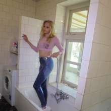 eileenvogel: W286 Eileen taking shower in pink crop top and jeans