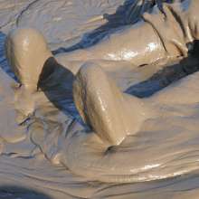 DungeonMasterOne: Waterproof rainwear boilersuit mudbath with Evelyne!