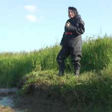 DungeonMasterOne: Waterproof rainwear boilersuit mudbath with Evelyne!