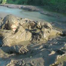 DungeonMasterOne: Waterproof rainwear boilersuit mudbath with Evelyne!