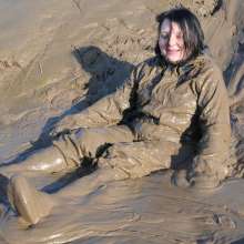 DungeonMasterOne: Waterproof rainwear boilersuit mudbath with Evelyne!
