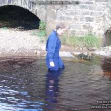 DungeonMasterOne: Purity takes a fully-clothed bath in the river!