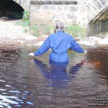 DungeonMasterOne: Purity takes a fully-clothed bath in the river!