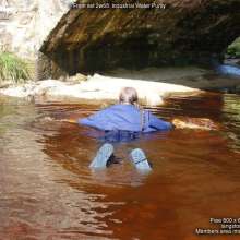 DungeonMasterOne: Purity takes a fully-clothed bath in the river!