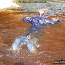 DungeonMasterOne: Purity takes a fully-clothed bath in the river!
