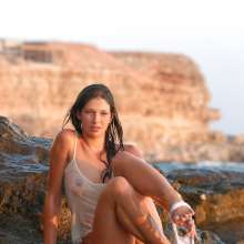 Chuck M: Girl on the rocks