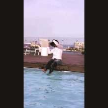 Aqua: Pool Break in Malta in Jeans and Blouse