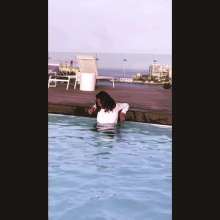 Aqua: Pool Break in Malta in Jeans and Blouse