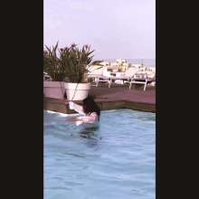 Aqua: Pool Break in Malta in Jeans and Blouse