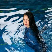 wet.look.me: Wetlook girl swimming in Pool in Fishnet tights and Shorts | Wetlook.biz