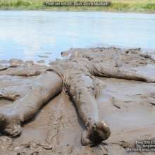 DungeonMasterOne: Miss Abigail takes a mudbath in shiny shorts!