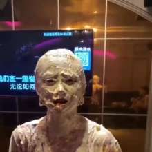 Gater: Web video of Chinese woman completely covered in cream