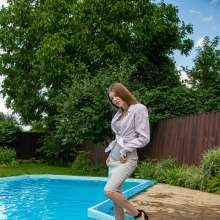 wet.look.me: Wetlook girl in Dress and heels swims in the pool | Wetlook.biz