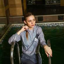 wet.look.me: Wetlook girl in gray tracksuit swims in the pool dressed | Wetlook.biz