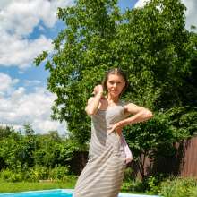 wet.look.me: Wetlook girl in Dress and heels swims in the pool | Wetlook.biz