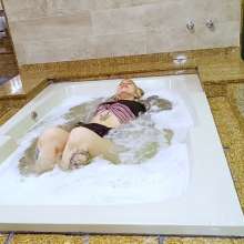 wet.look.me: Wetlook girl gets wet in jacuzzi in stockings and skirt | Wetlook.biz