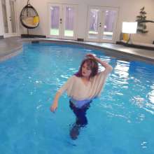 WetlookFashion: Petra Takes a Dip in Jeans, Sweater and Boots