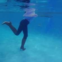 WetlookFashion: Petra Takes a Dip in Jeans, Sweater and Boots