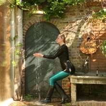 eileenvogel: W450 Eileen in spandex dress under the outside shower