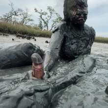 Messy Temptress: Messy Temptress Gives a Filthy Footjob in the Mud!