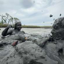 Messy Temptress: Messy Temptress Gives a Filthy Footjob in the Mud!
