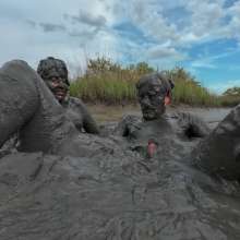Messy Temptress: Messy Temptress Gives a Filthy Footjob in the Mud!