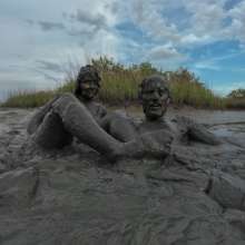 Messy Temptress: Messy Temptress Gives a Filthy Footjob in the Mud!