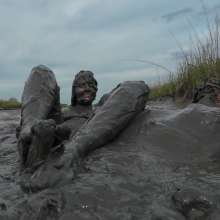 Messy Temptress: Messy Temptress Gives a Filthy Footjob in the Mud!