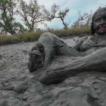 Messy Temptress: Messy Temptress Gives a Filthy Footjob in the Mud!