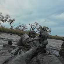 Messy Temptress: Messy Temptress Gives a Filthy Footjob in the Mud!