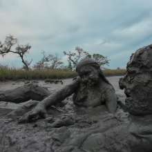 Messy Temptress: Messy Temptress Gives a Filthy Footjob in the Mud!