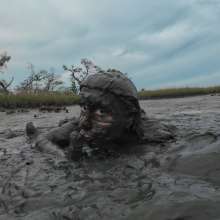 Messy Temptress: Messy Temptress Gives a Filthy Footjob in the Mud!