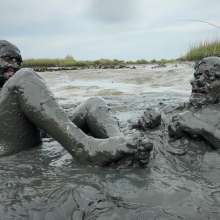 Messy Temptress: Messy Temptress Gives a Filthy Footjob in the Mud!